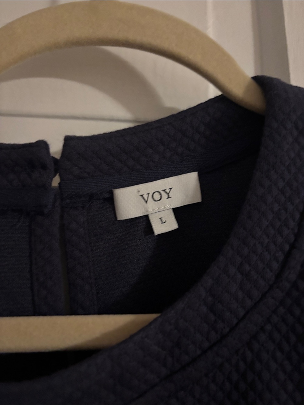 Navy Ruffle Sleeve Top with Striped Trim - Picture 2 of 4